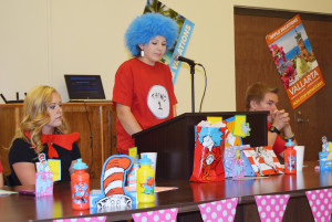 Raylee Brown wearing her Thing 1 tag and blue wig went all in for the Dr. Seuss theme as she welcomed guests to the Montague County 4-H banquet Sunday. (Photo by Barbara Green) 