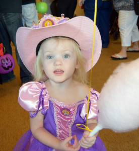 little girl with cotton candy