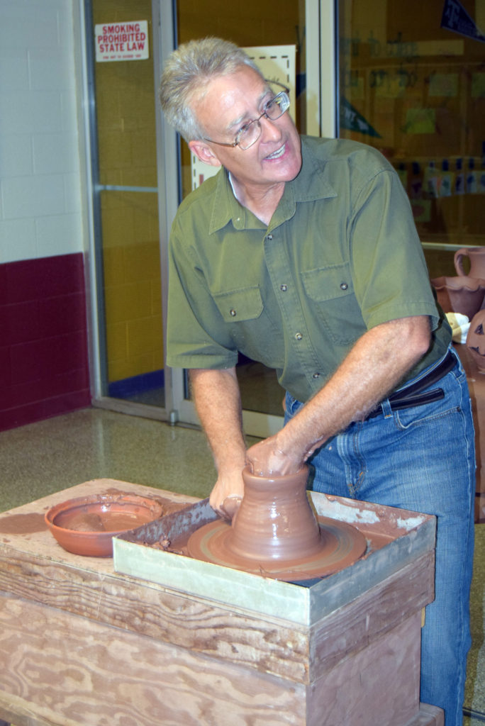 guy-throwing-pottery