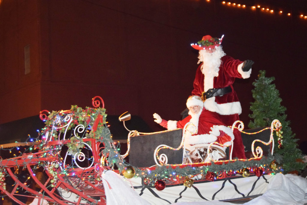 Santa and Mrs. Claus arrive for the 25th annual Fantasy of Lights Christmas Parade Thursday. (Photo by Barbara Green) 