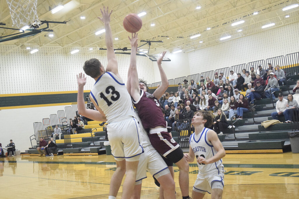 Boston Farris barrels into three Peaster defenders to earn free throw ...